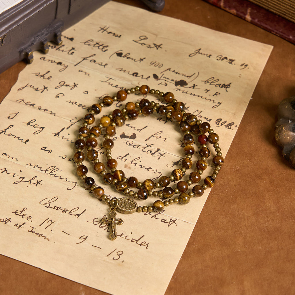 Christianartworkshop Pulsera de rosario elástica hecha a mano con piedra ojo de tigre: una joya espiritual de doble propósito. - image 1