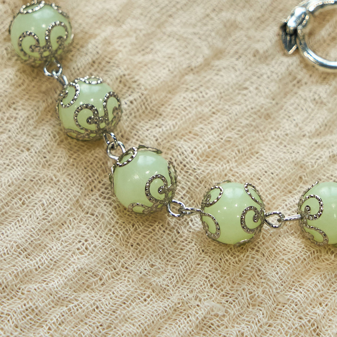 Christianartworkshop Pulsera luminosa de rosa con crucifijo y cuentas verdes: Luz de ensueño de fe. - image 4