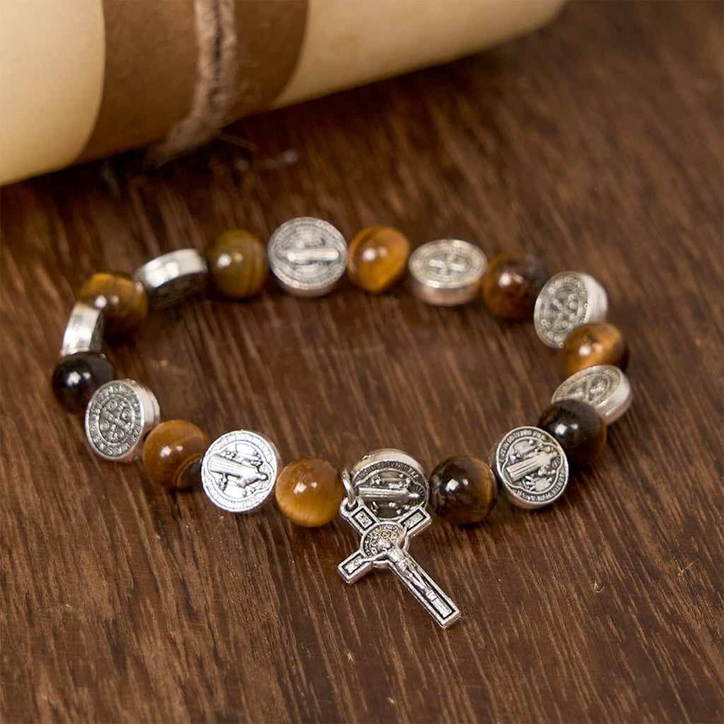Christianartworkshop Pulsera de ojo de tigre con el símbolo de San Benito: una fusión de fe y belleza. - image 0