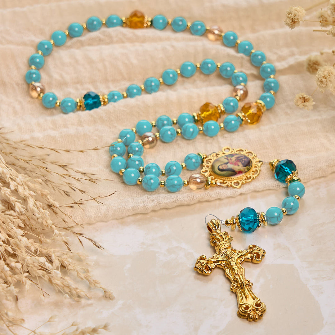 Christianartworkshop Rosario artesanal de turquesa y aleación de oro con crucifijo y medalla de Santa Teresa: Un vínculo espiritual lleno de gracia. - image 3