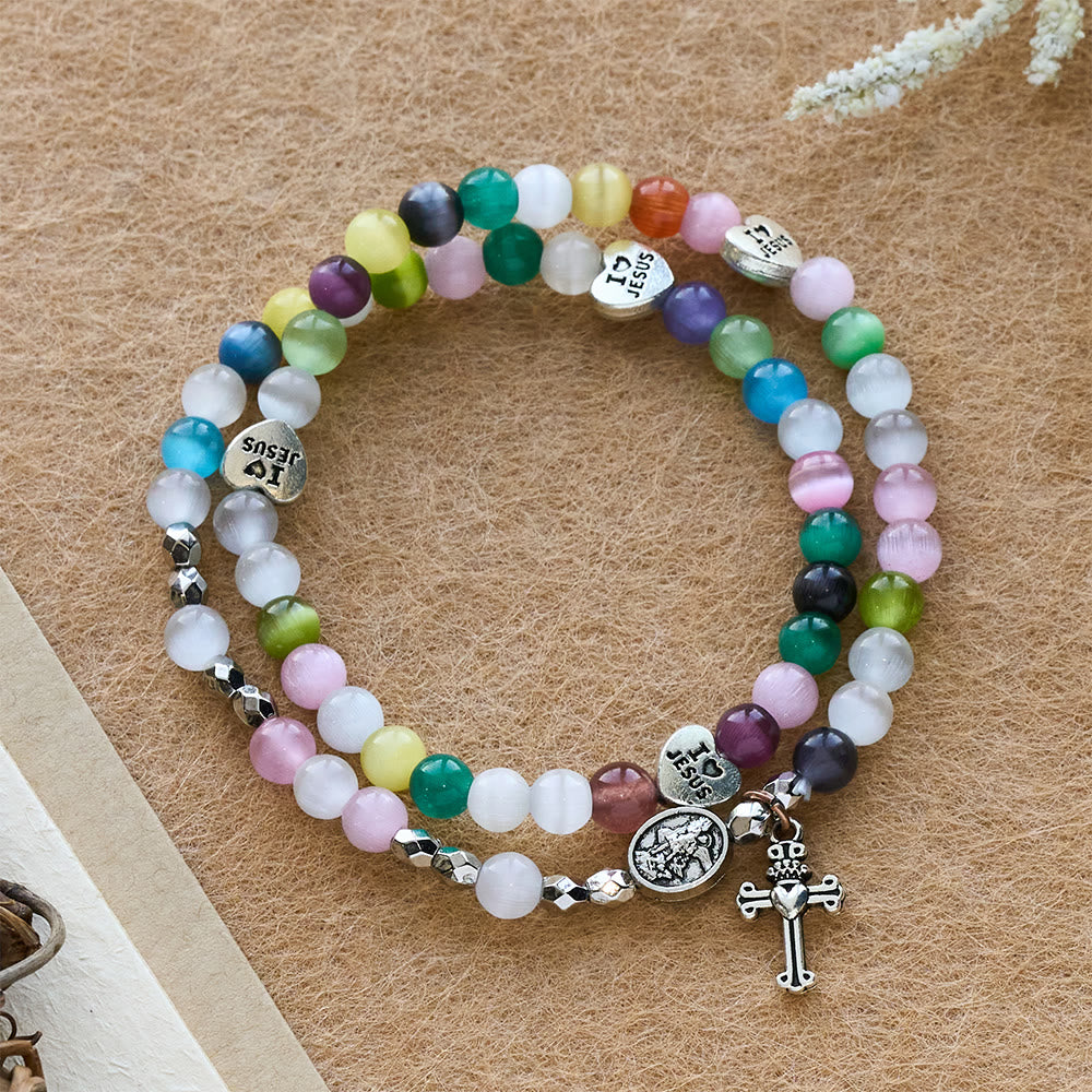 Christianartworkshop Pulsera multicolor de cuentas de ojo de gato (collar para niños) con medallas "Amo a Jesús" y del Arcángel. - Medalla de la Cruz y el Ángel - image 0
