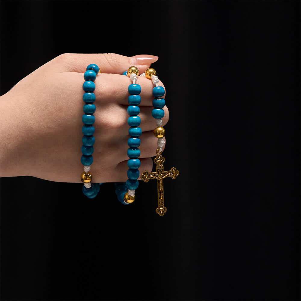 Christianartworkshop Rosario de cuentas de madera azul con medallón de la Virgen María: un símbolo de gracia y fe divina. - image 1