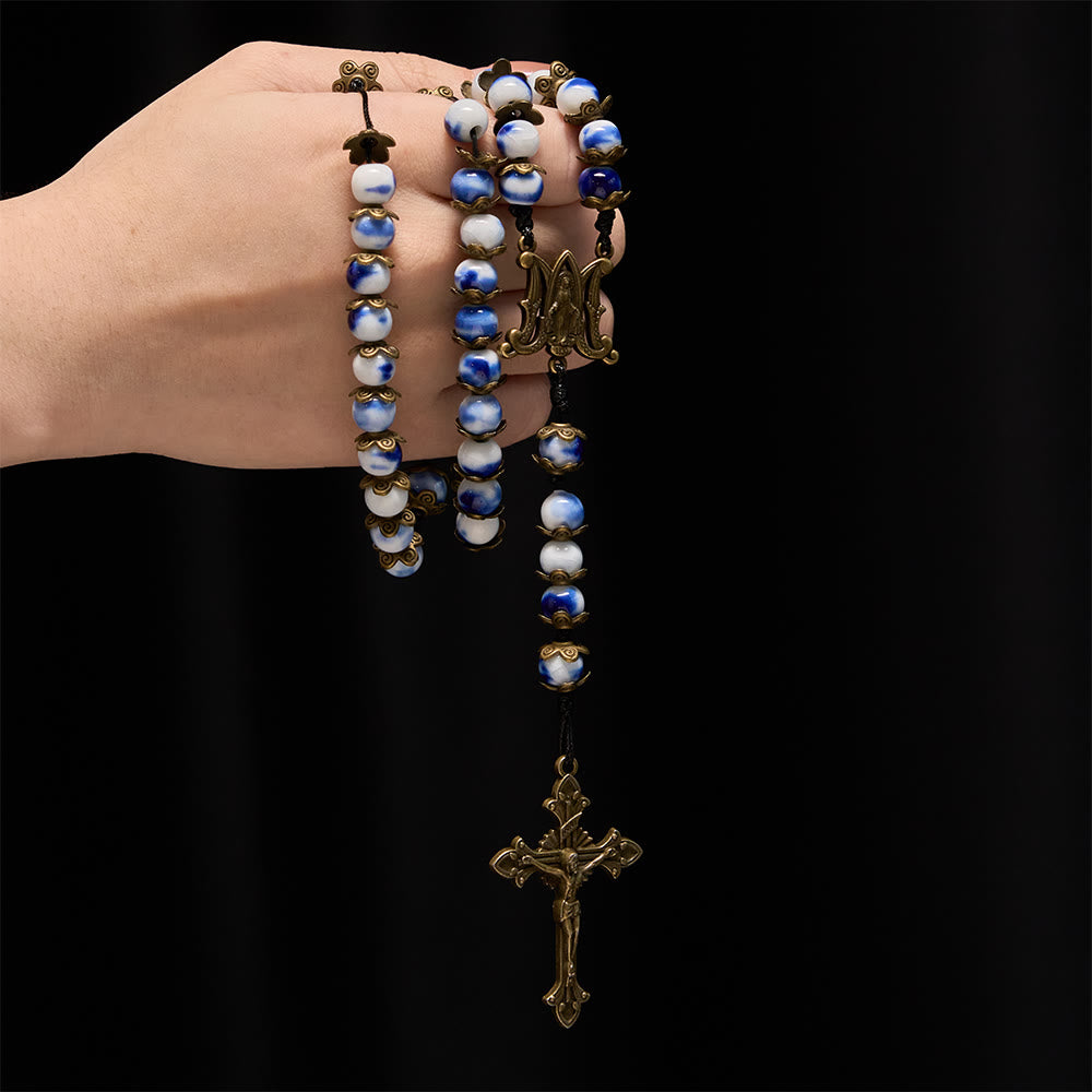 Christianartworkshop Rosario de cuentas azules y blancas con medalla milagrosa: un símbolo de la intercesión celestial. - image 1