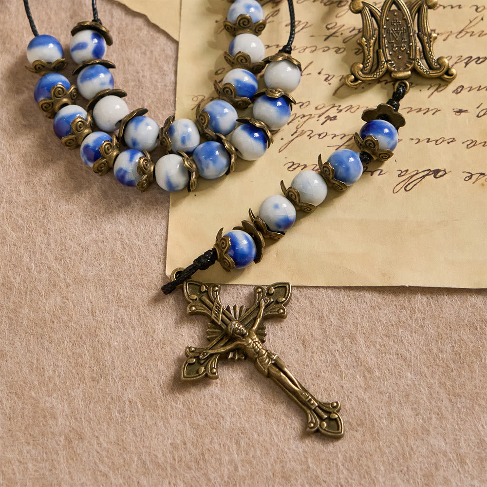 Christianartworkshop Rosario de cuentas azules y blancas con medalla milagrosa: un símbolo de la intercesión celestial. - image 8