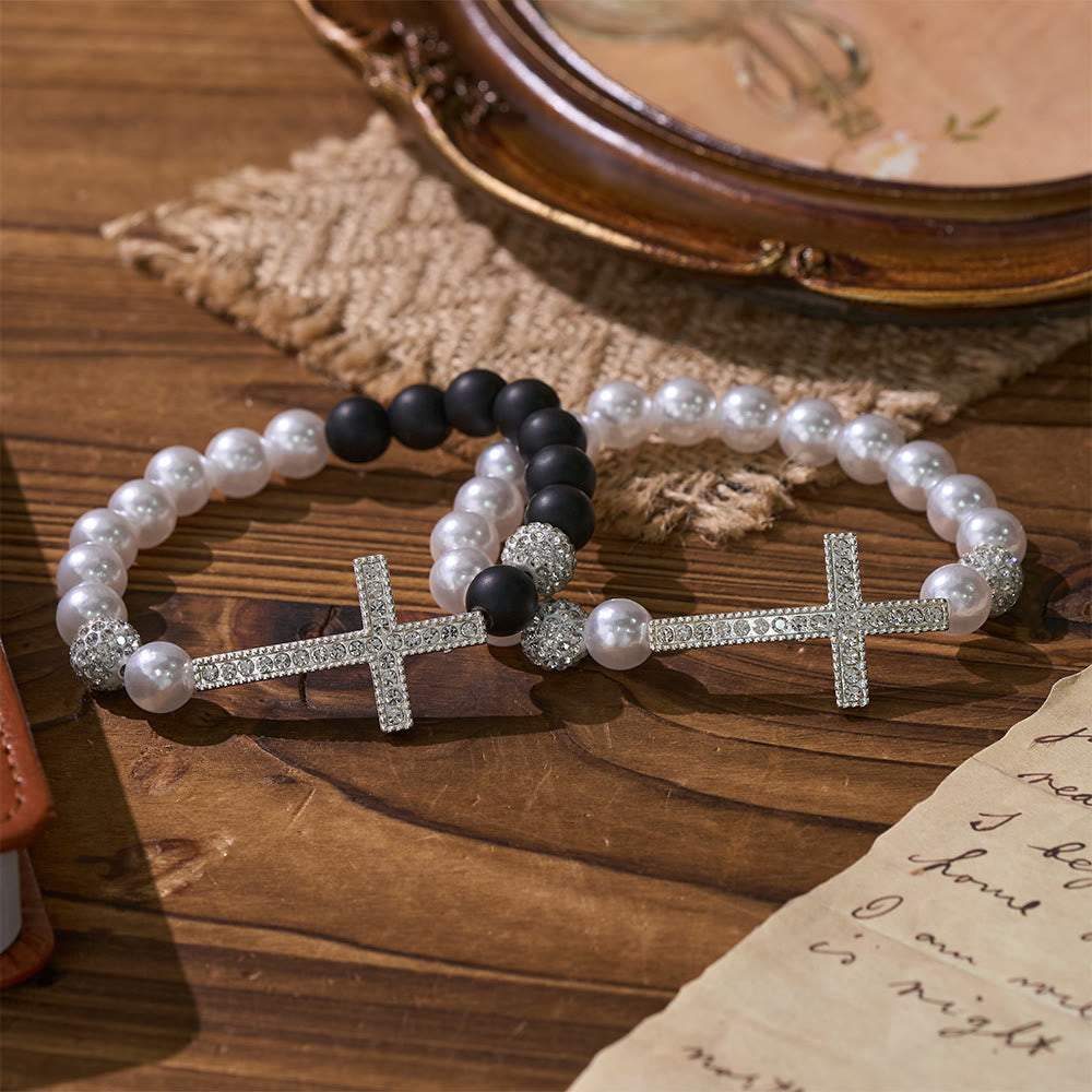 Christianartworkshop Conjunto de dos pulseras con cruz de cuentas blancas y negras: emblema de pureza y redención divinas. - Juego de 2 - image 0