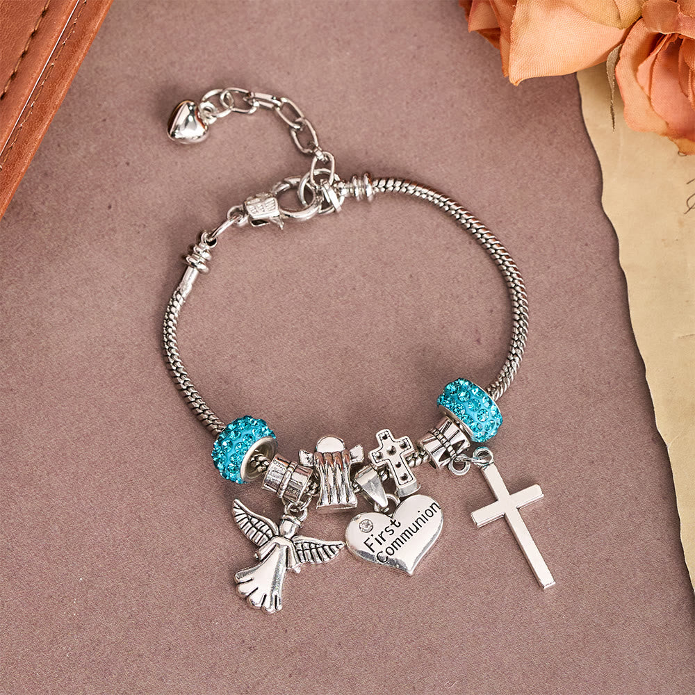 Christianartworkshop Pulsera con dije de ángel y cruz para la Primera Comunión Infantil: un símbolo de fe y bendición divina. - image 2
