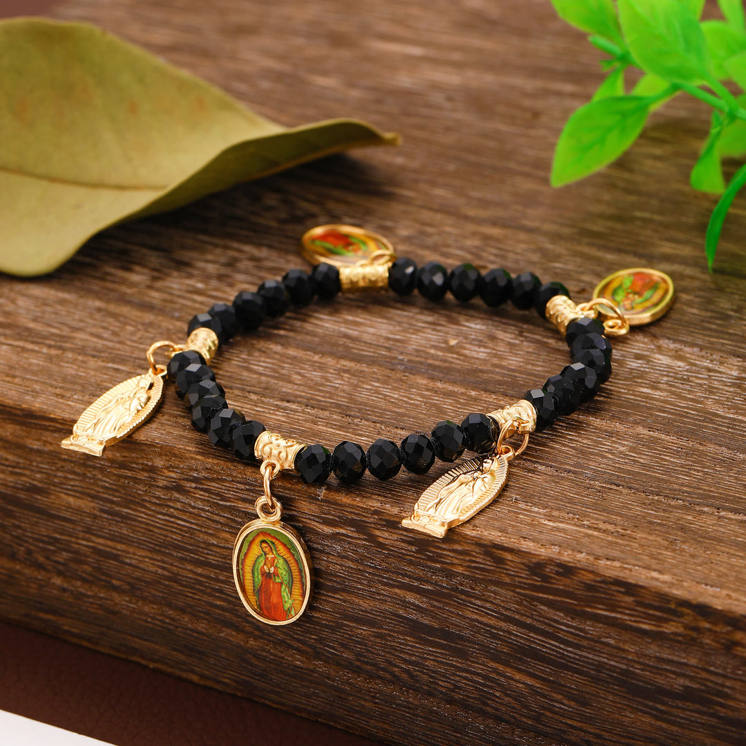 Christianartworkshop Pulsera de cuentas intrincadas con dijes de Nuestra Señora de Guadalupe y San Judas Tadeo: Un recordatorio del amor sagrado. - Negro - image 0