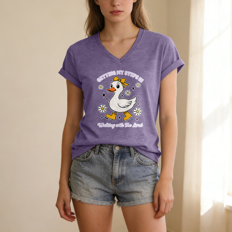Christianartworkshop Consiguiendo mis pasos Caminando con el Señor Pato Daisy de dibujos animados Camiseta informal con cuello en V - image 1