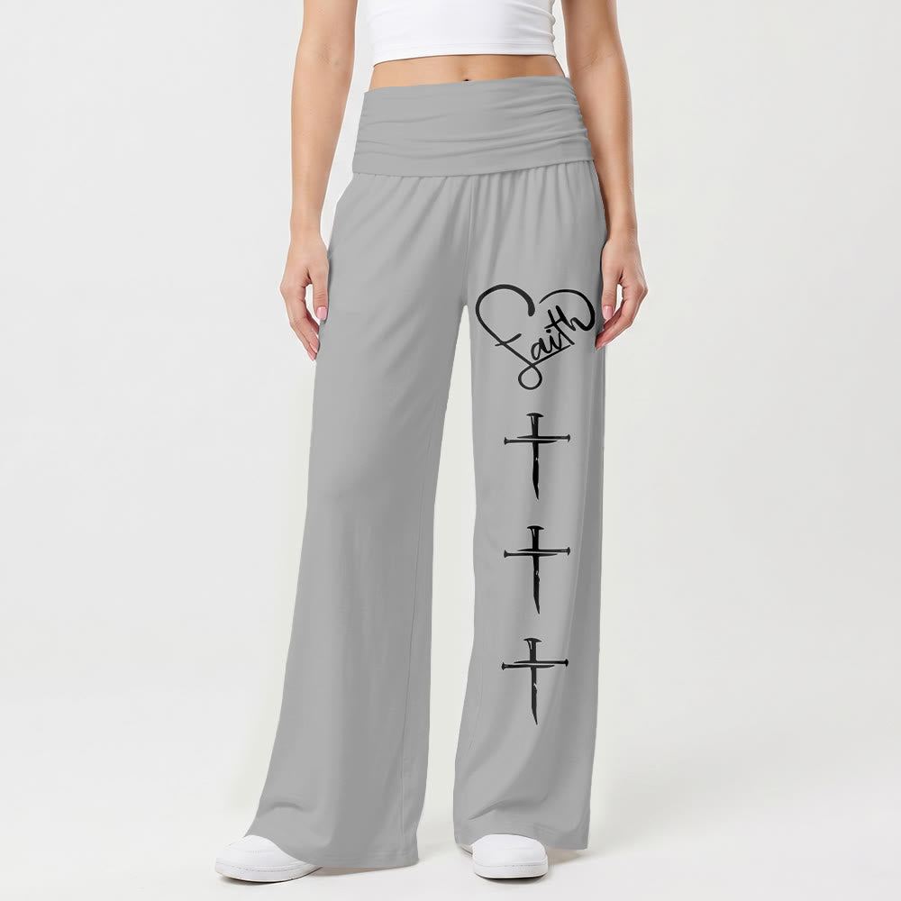 Christianartworkshop Pantalones de pierna ancha con estampado de cruz vertical y contorno de corazón en cursiva con tres clavos. - image 1