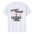 Christianartworkshop Camiseta clásica con estampado floral y la frase "Prueba viviente de un Dios amoroso" a doble cara. - Blanco - 2XL - image 0
