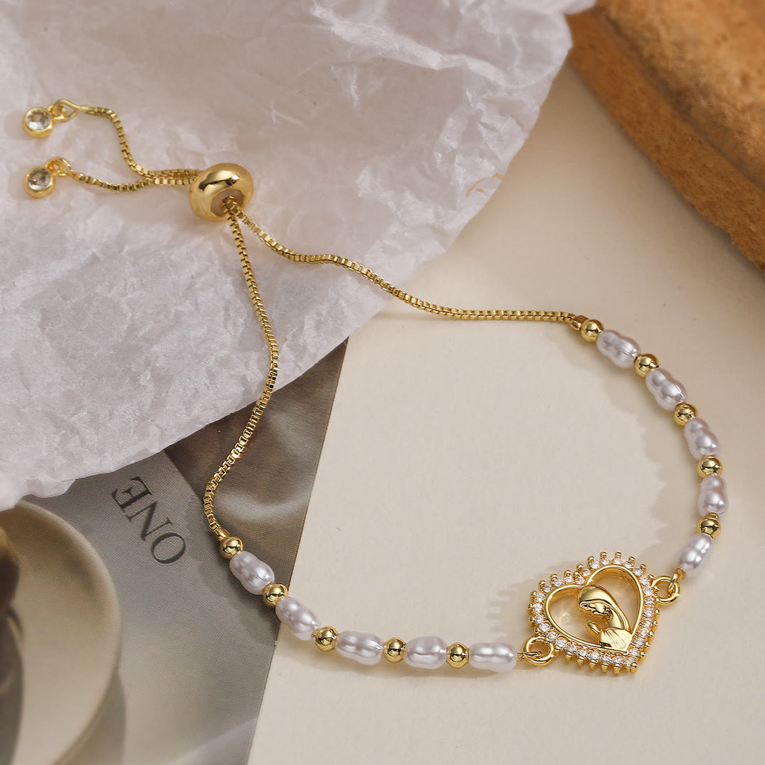 Christianartworkshop Pulsera de perlas con medallón sagrado de estilo variado y refinado: un símbolo de fortaleza espiritual serena para el uso diario. - Marco de corazón hueco abierto - image 2