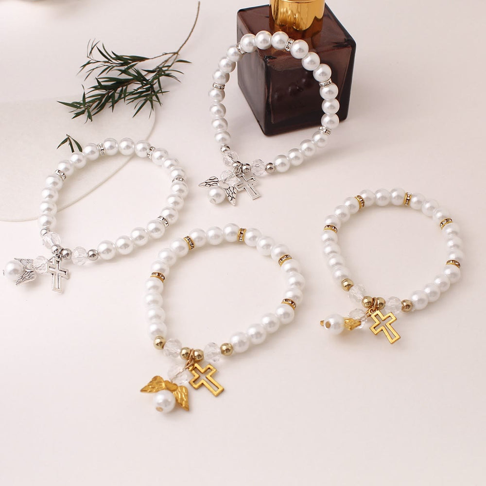 Christianartworkshop Pulsera elástica con cruz y perlas brillantes: emblema de pureza celestial. - image 1