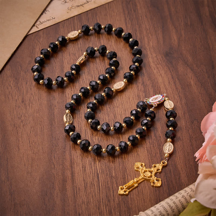 Christianartworkshop Rosario de lujo de cristal negro facetado con crucifijo dorado ornamentado y medalla de Nuestra Señora. - Rosario de la Virgen María Negra - image 0