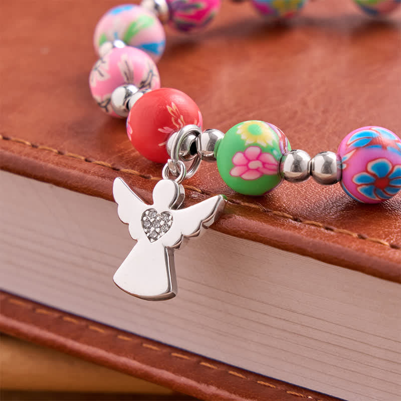 Christianartworkshop Pulsera con estampado floral, cruz y Espíritu Santo: portadora de suave protección divina. - image 7