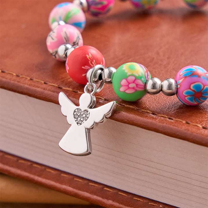 Christianartworkshop Pulsera con estampado floral, cruz y Espíritu Santo: portadora de suave protección divina. - image 7