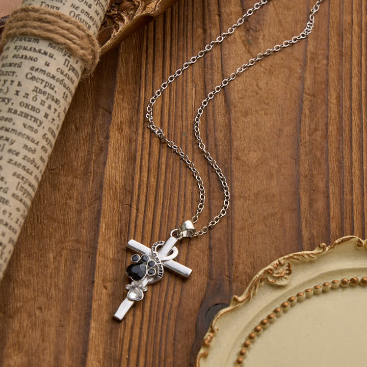 Christianartworkshop Collar con cruz de aleación con huella de pata: emblema de tierno recuerdo celestial. - image 1